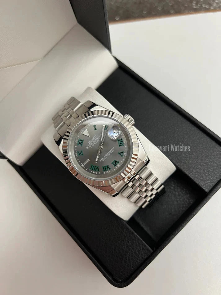 Datejust (Wimbledon Grey) Seiko NH35 automatic mod watch. A full watch with a dark grey dial and silver fluted bezel in a box with a white pillow.