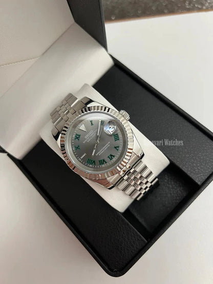 Datejust (Wimbledon Grey) Seiko NH35 automatic mod watch. A full watch with a dark grey dial and silver fluted bezel in a box with a white pillow.