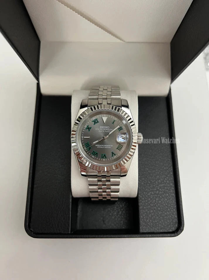 Datejust (Wimbledon Grey) Seiko NH35 automatic mod watch. A full watch with a dark grey dial and silver fluted bezel in a box with a white pillow.