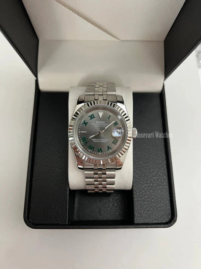 Datejust (Wimbledon Grey) Seiko NH35 automatic mod watch. A full watch with a dark grey dial and silver fluted bezel in a box with a white pillow.