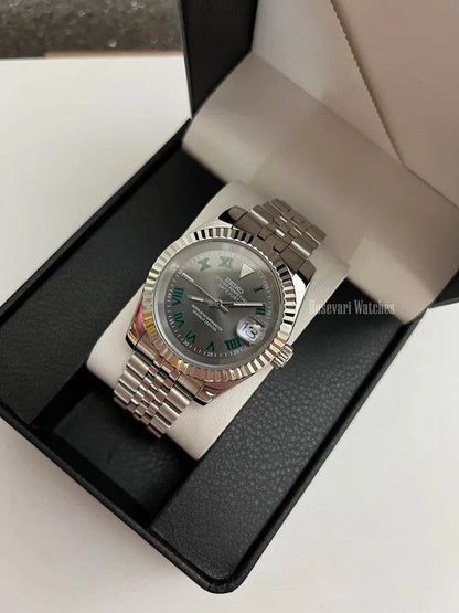 Datejust (Wimbledon Grey) Seiko NH35 automatic mod watch. A full watch with a dark grey dial and silver fluted bezel in a box with a white pillow.