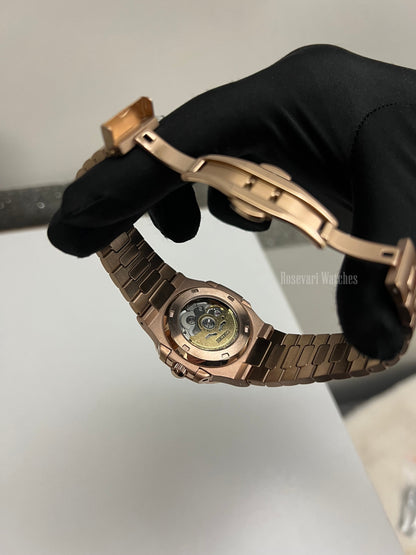 Nautilus (Open Heart, Chocolate) Seiko NH38 open-heart automatic mod watch. A caseback detail shot showing the mechanical movement and the rose gold bracelet clasp.