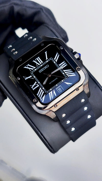 Santos (Black) Seiko NH35 automatic mod watch. A full watch shot showing a black dial with white Roman numerals and a black rubber strap.